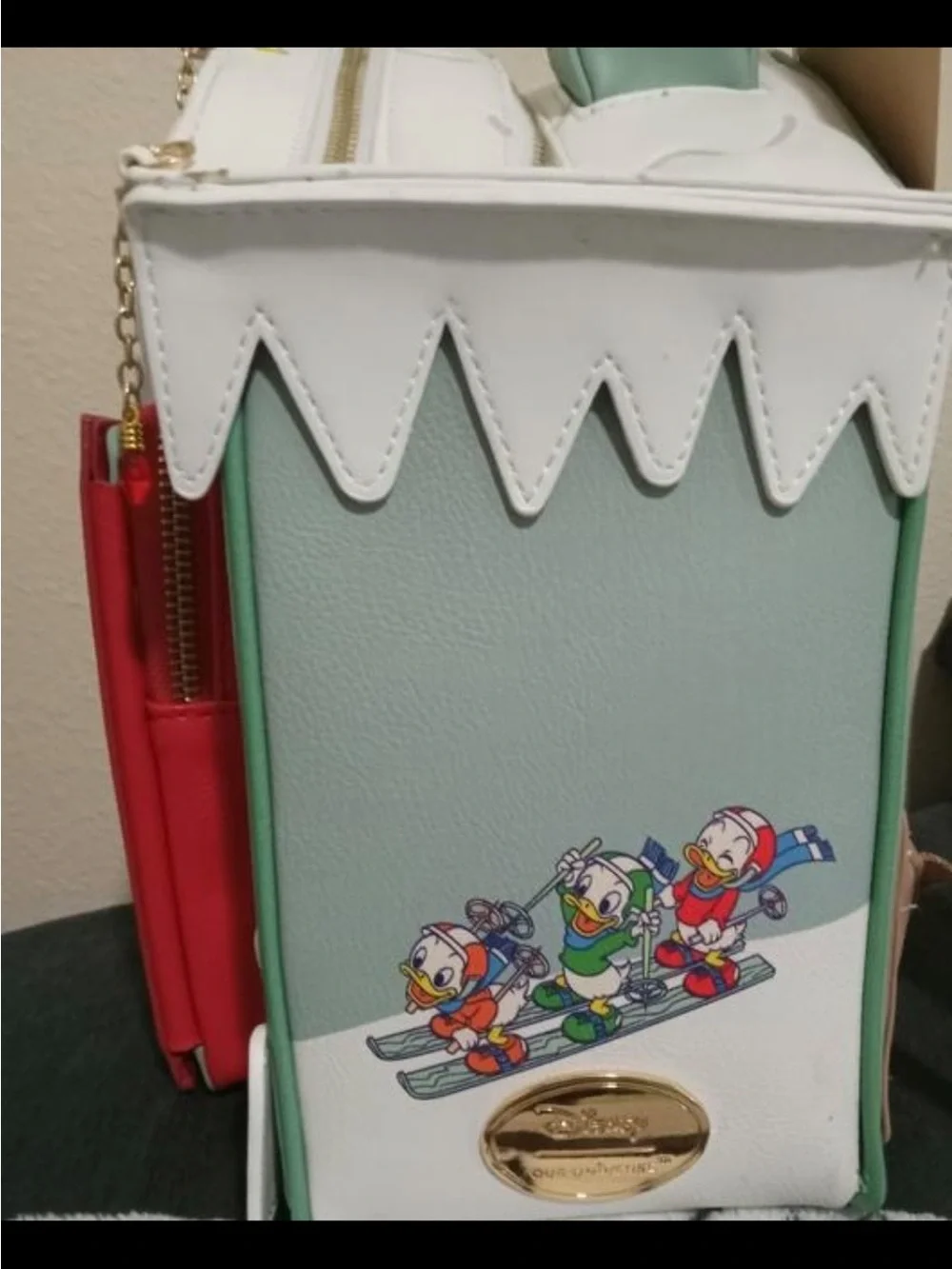 Mickey Mouse & Friends Ski House backpack.
